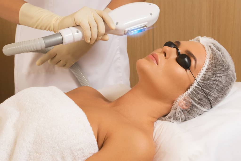 Portfolio 4 Beautiful woman in professional beauty salon during photo rejuvenation procedure | Glam Bar Medical Spa in Los Angeles CA